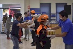 El Voluntariado municipal coopera en las descargas y reparto de 41.136 kilos de comida del Banco de Alimentos para familias en apuros