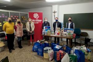 NNGG del Partido Popular de Castellón dona a Cáritas juguetes y alimentos de su campaña ‘Ningún niño sin ilusión”