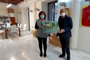 La Pobla Llarga rep una donació d’una pintura de la família Lahuerta Talens per a la seua col·lecció museística