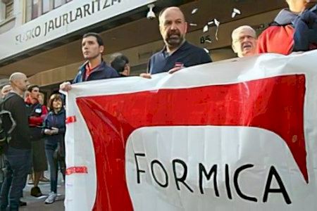 Los trabajadores de FORMICA en Albal convocan una huelga contra el uso de la la Gorra-Casco